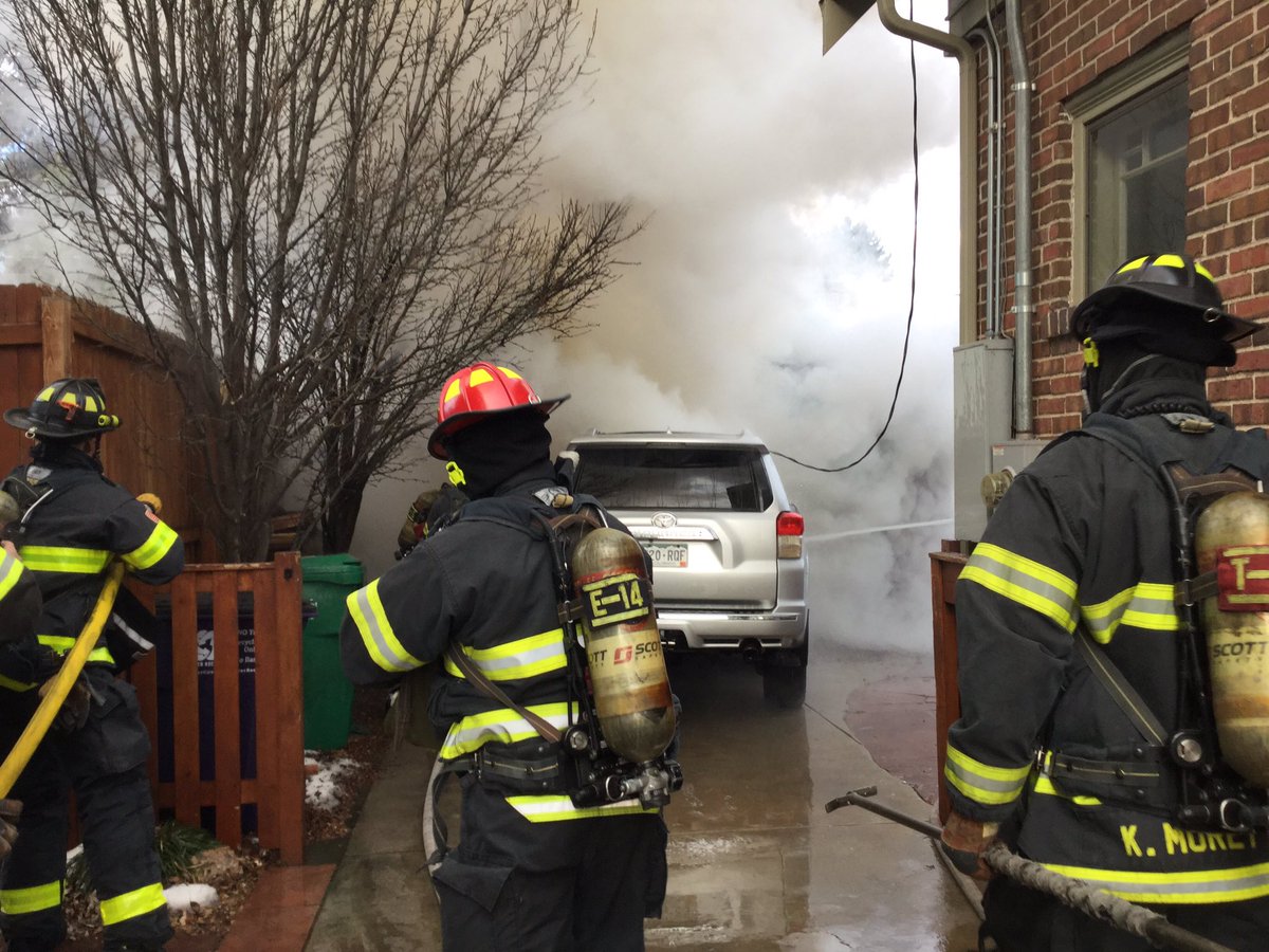 Denver fire crews battle smoke and flames from garage fire